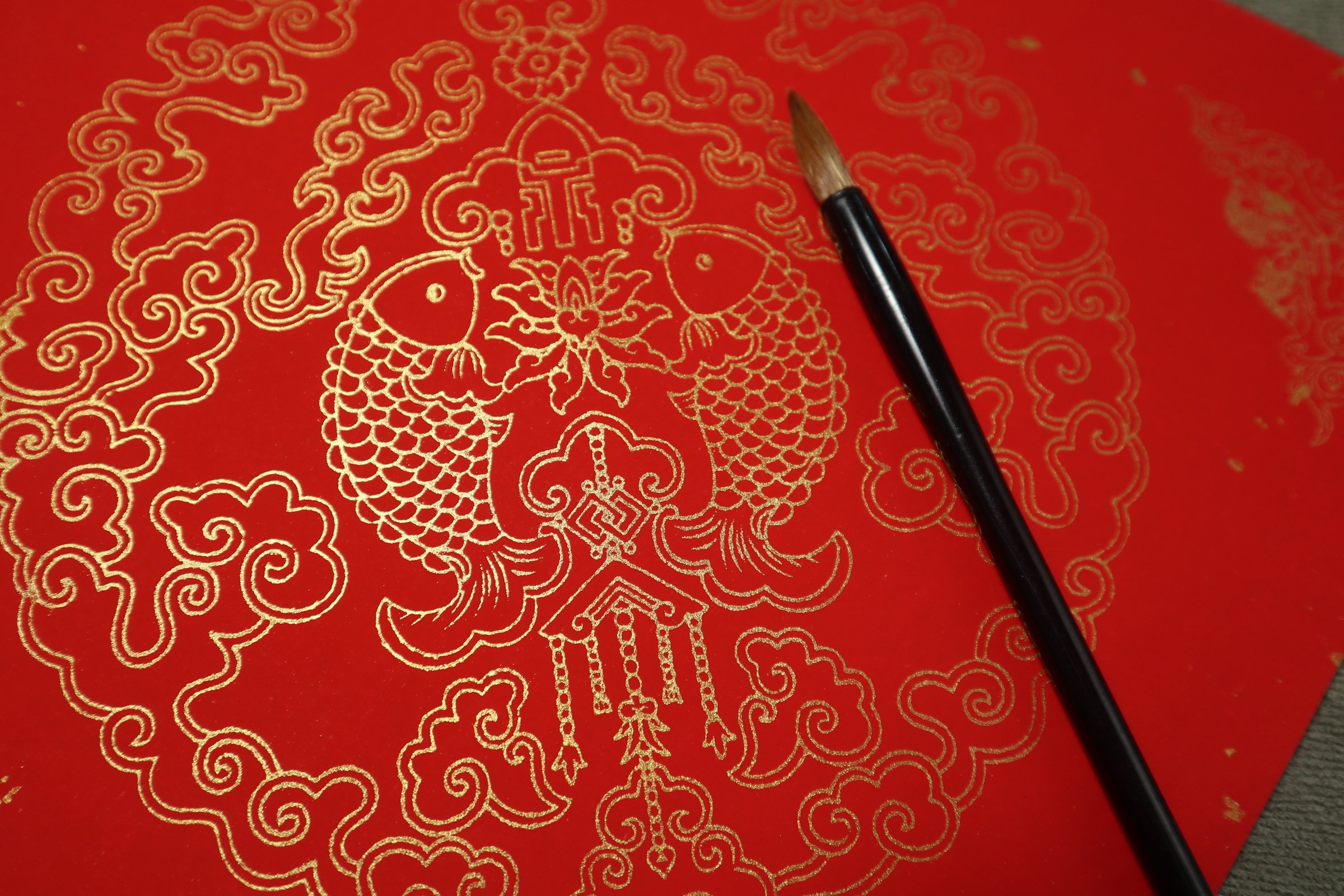 red and golden spring couplet paper with chinese writing brush design for chinese new year and blessing icon concept